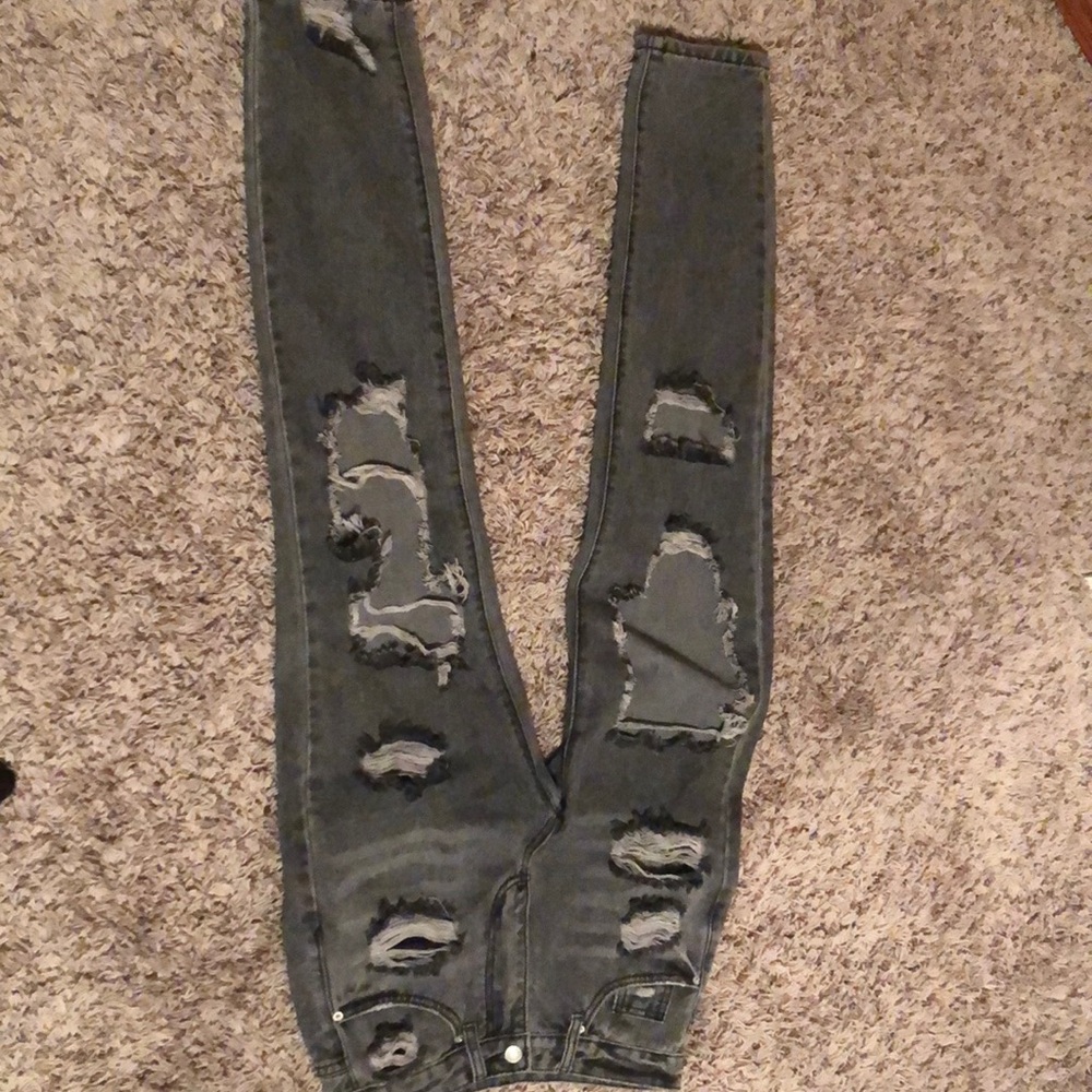 Ripped straight legged jeans